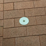Termiwatch concrete cover shown in situ in pavers
